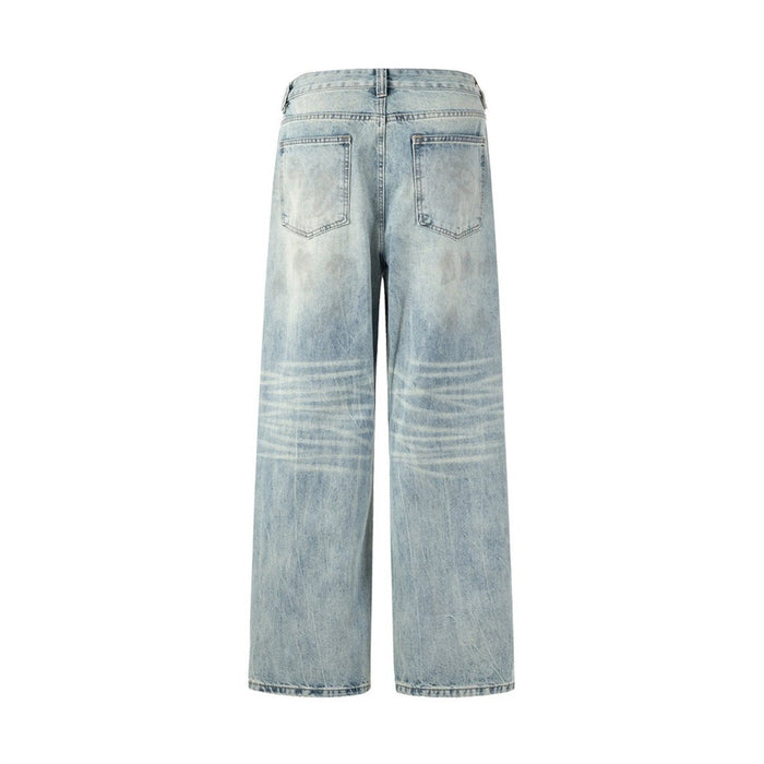 Back flat lay of light-wash wide-leg jeans showing two patch pockets and faded leg details