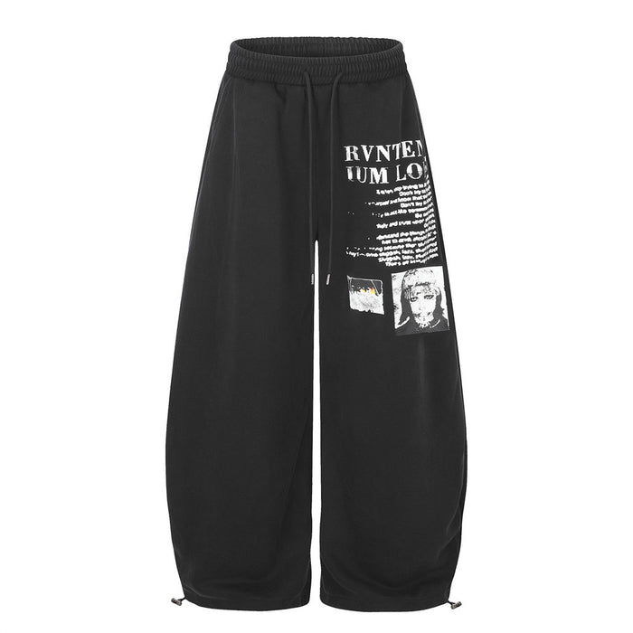 Black wide-leg sweatpants with white graphic letter print, front view