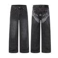 Washed black wide-leg jeans shown front and back, with red contrast stitching and gray wing prints with a center star