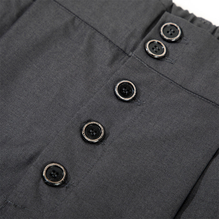 Close-up of black button fly on culottes shorts with stitched button detail