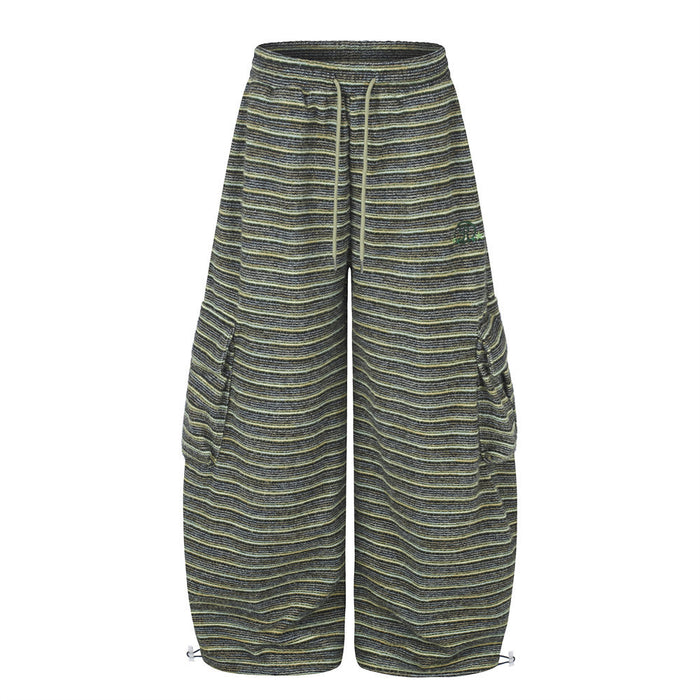 Wide-leg striped cargo pants with side cargo pockets and drawstring waist in green stripe colorway
