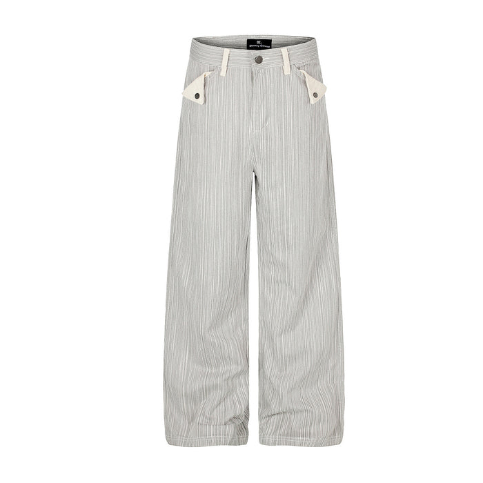 Gray pinstripe wide-leg jeans with cream contrast snap front pockets and studded back patch pockets, front and back view
