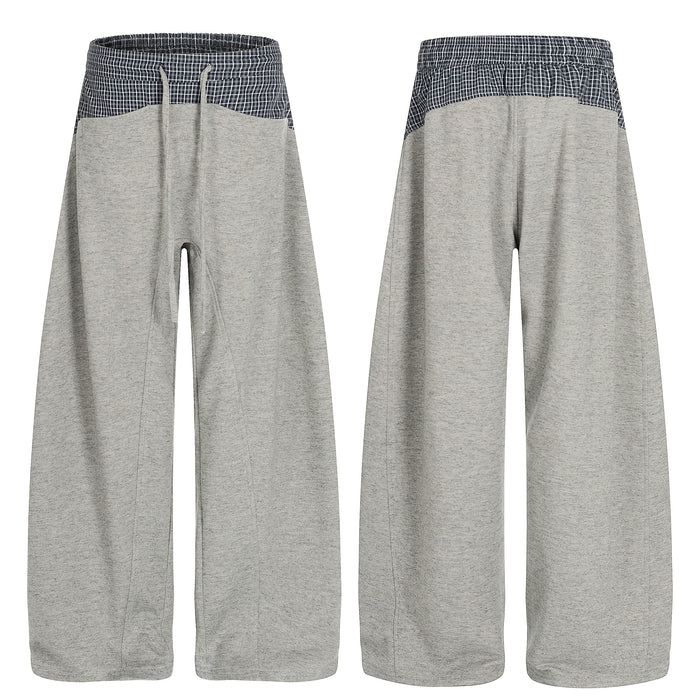Grey wide-leg sweatpants with navy check contrast layered waistband, front and back view on white background