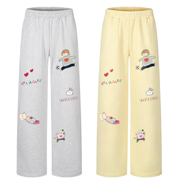 Wide-leg sweatpants shown in gray and pale yellow, with elastic waists and colorful cartoon character prints