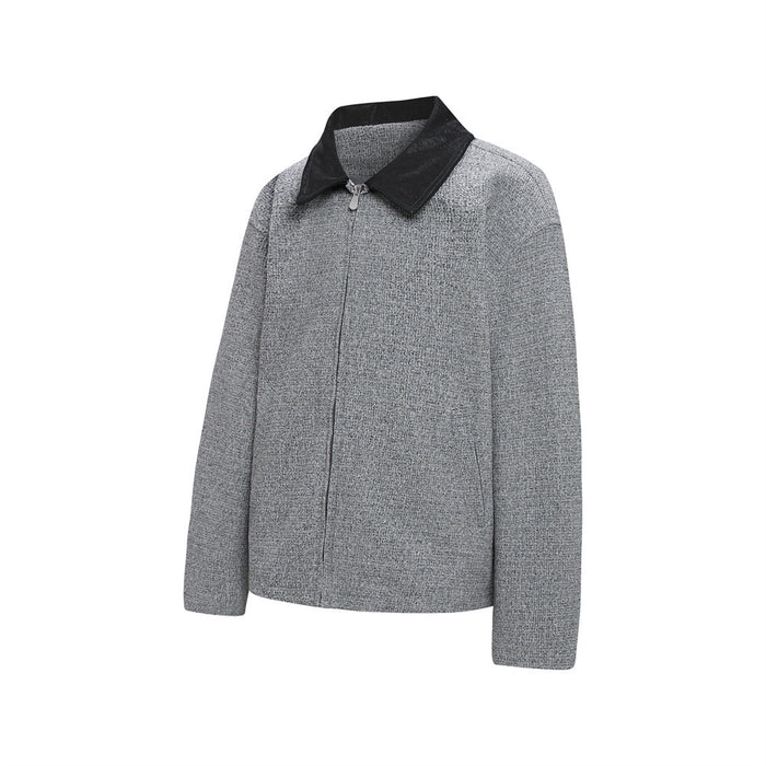 Front three-quarter view of a grey tweed zip-up jacket with long sleeves and a black collar