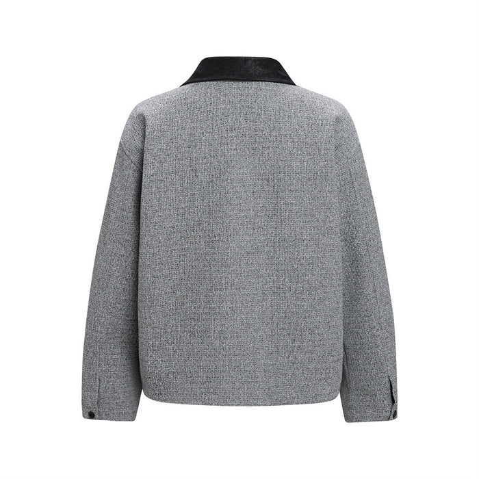 Back view of a grey tweed-weave jacket with a contrasting black collar and buttoned cuffs